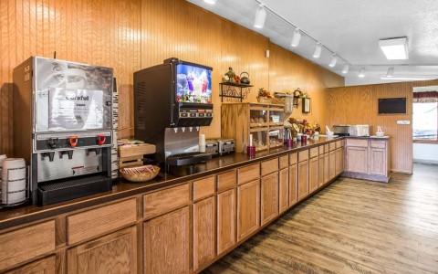 coffee and juice dispensers on breakfast counter