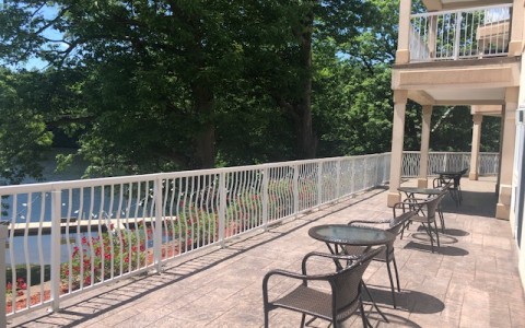 terrace with seating area overlooking river