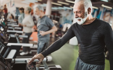man using treadmill at gym
