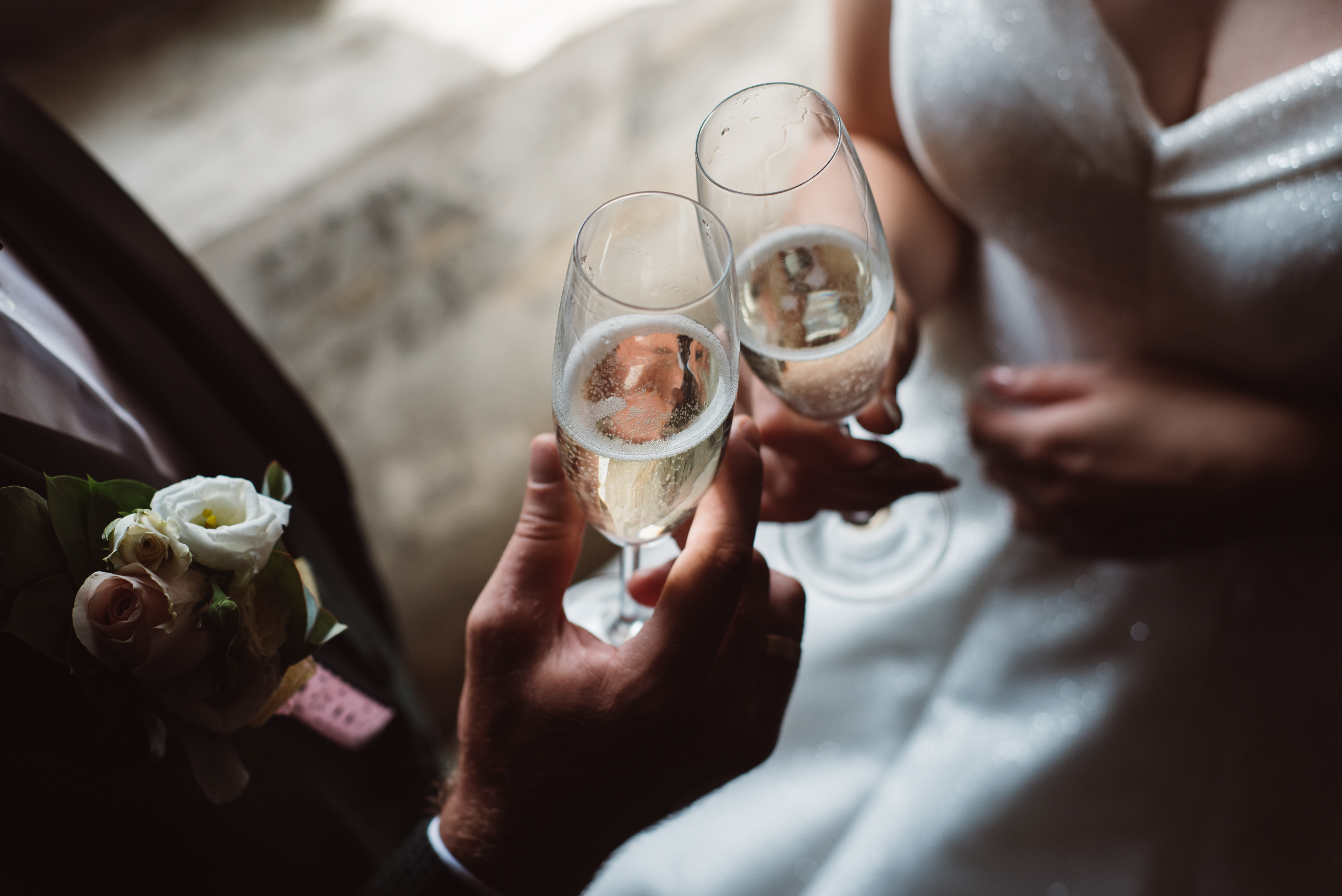 woman and man cheering with champagne