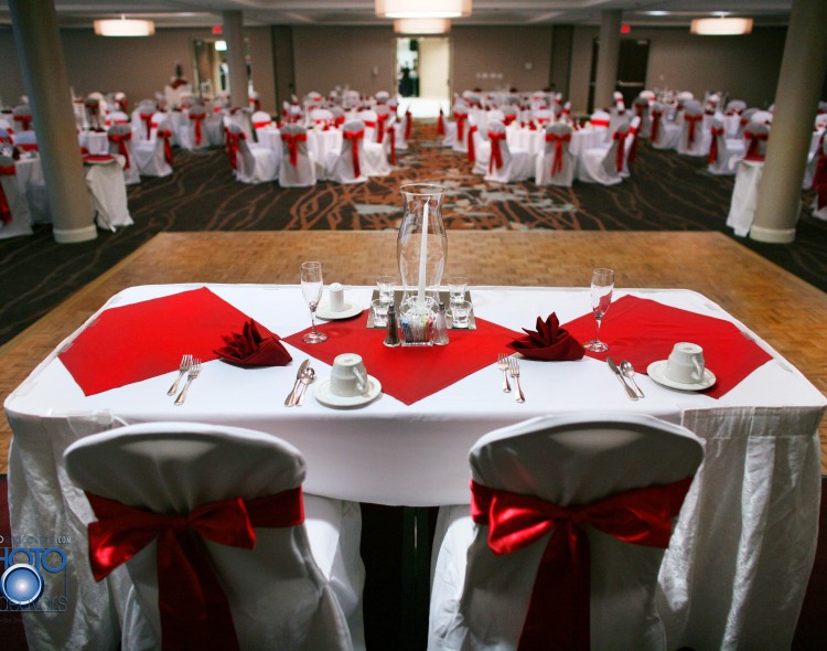 rectangular table facing round tables