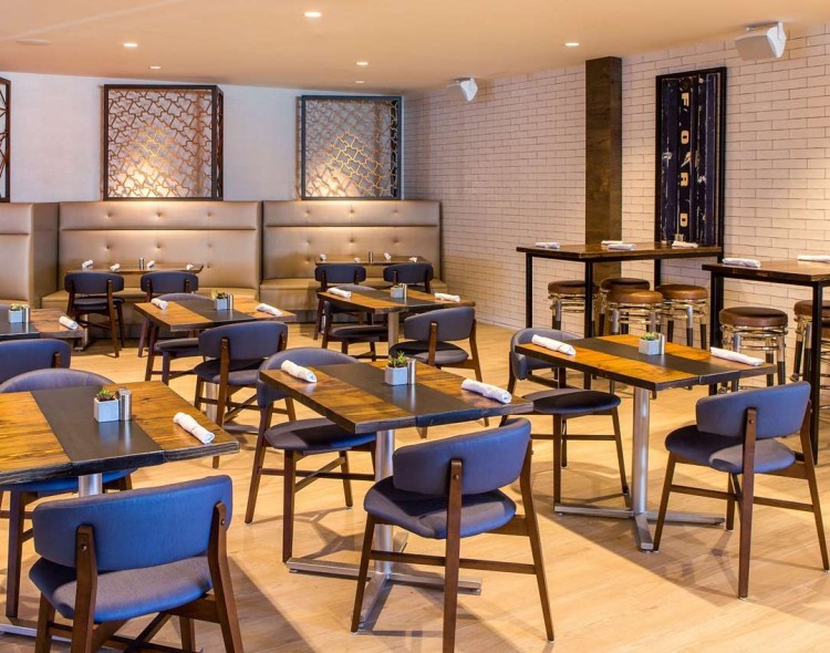 dining area with tables for two people