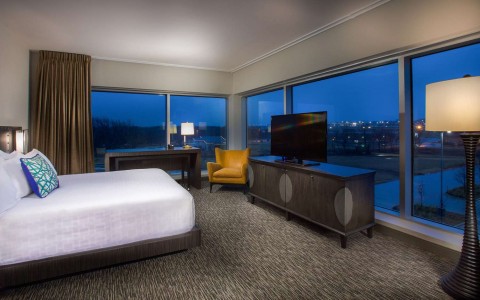 suite with glass windows surrounding the room