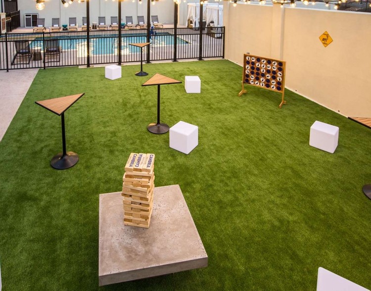 Pool area with backyard games