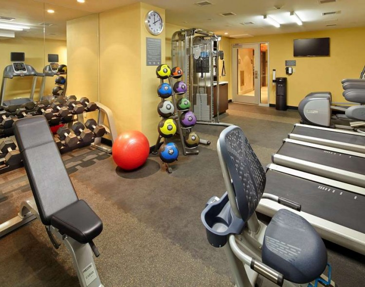 hotel gym with weight and cardio equipment