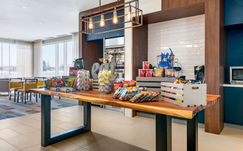 Hotel marketplace with various snacks on a table