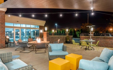 Outdoor patio with seating and a fire pit
