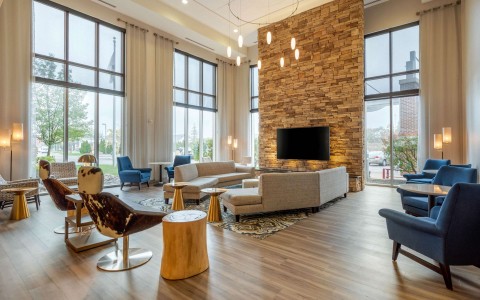 Spacious lobby with sitting area and tv