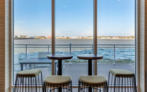 stools and high tables overlooking the ocean