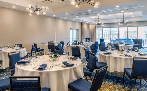 event space set up with round banquet tables