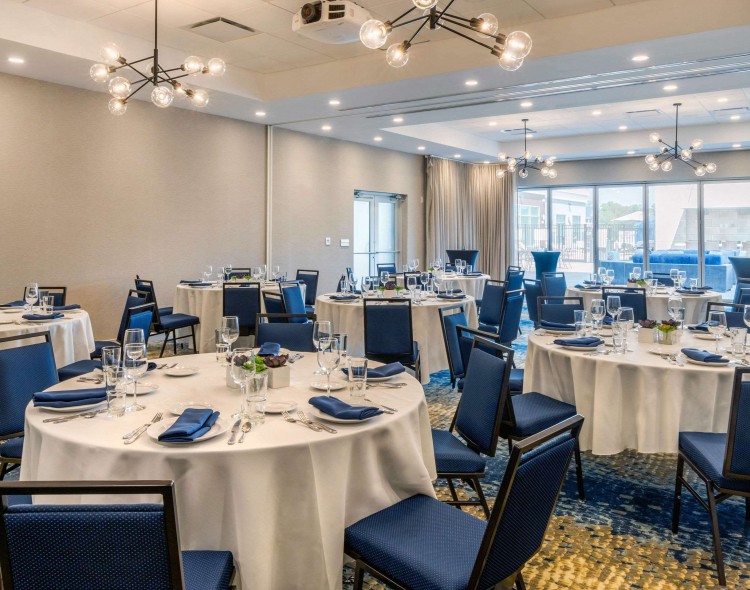 event space set up with round banquet tables
