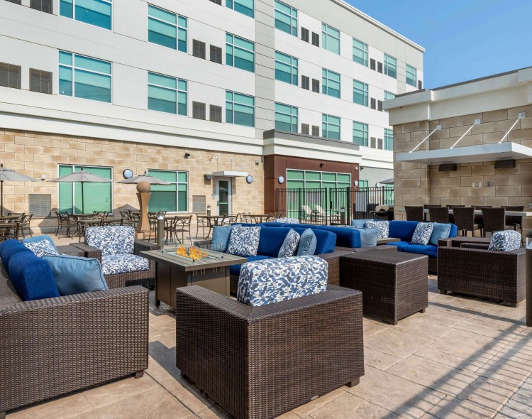 sundeck with seating around fire pit
