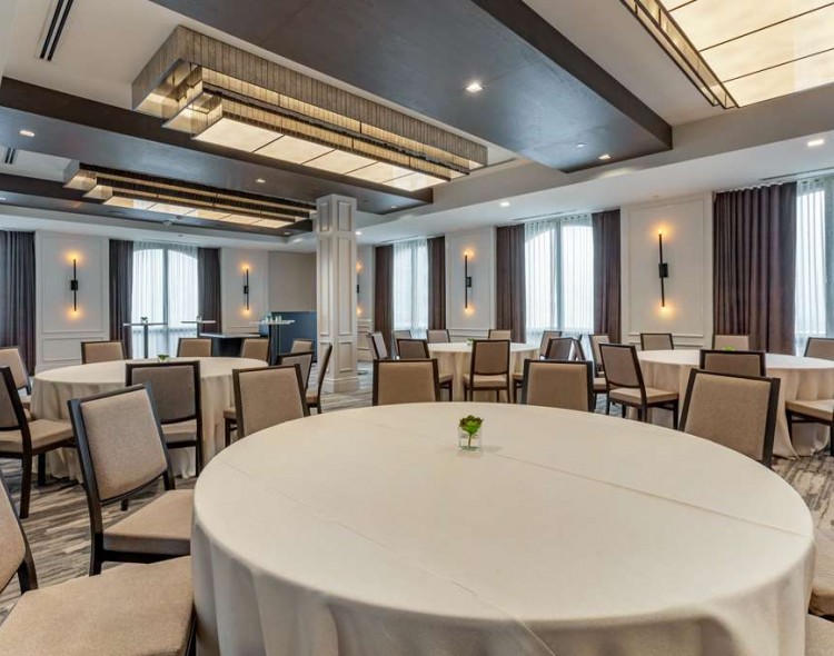 event space set up with banquet tables