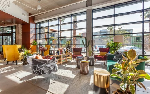 the colorful lobby with lots of natural light