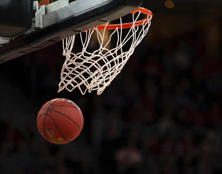 basketball going through basketball hoop