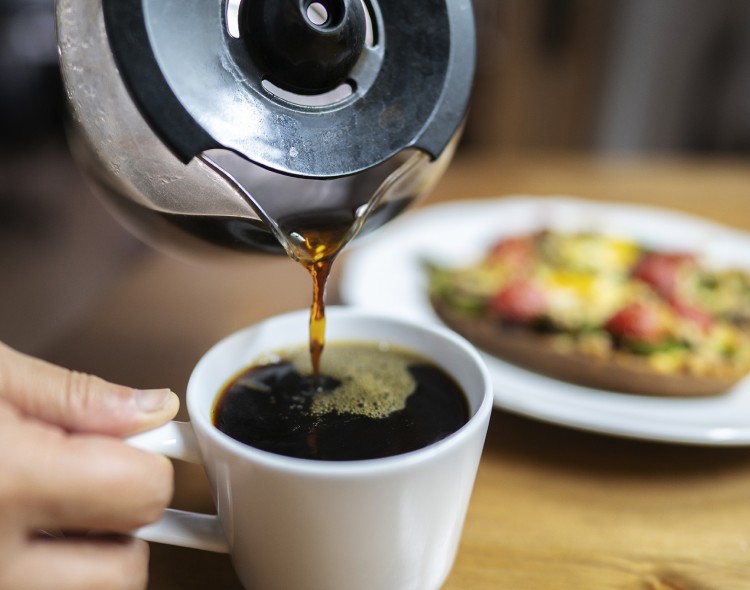 coffee being poured into mug