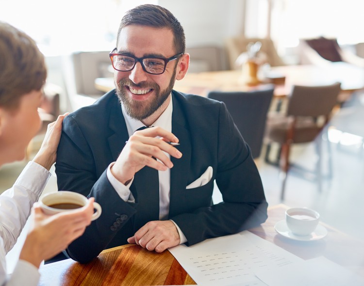 colleagues discussing at a table