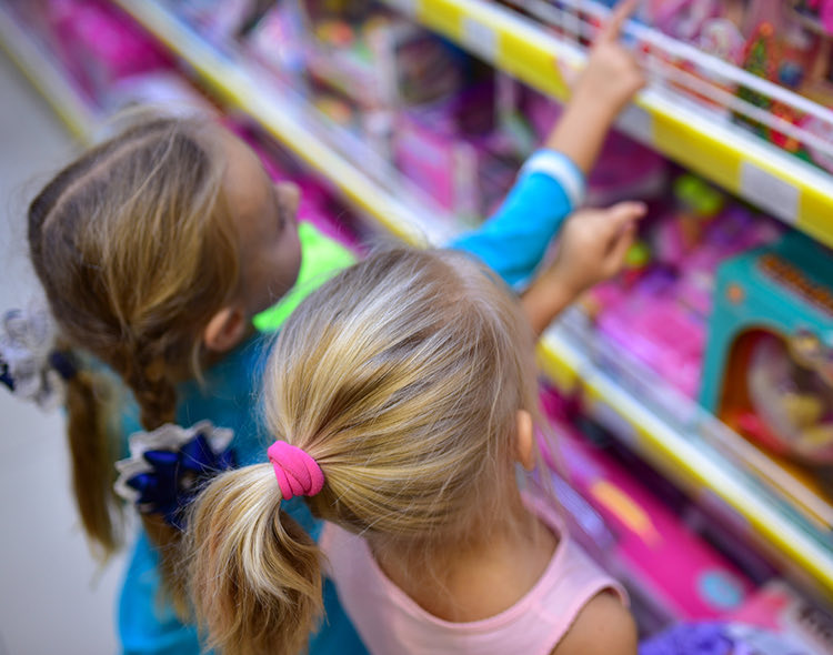 kids looking at toys at a store