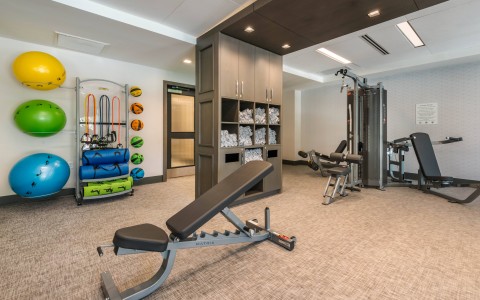 fitness center with workout equipment