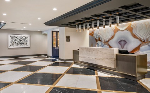 hotel lobby with black and white checkered floors