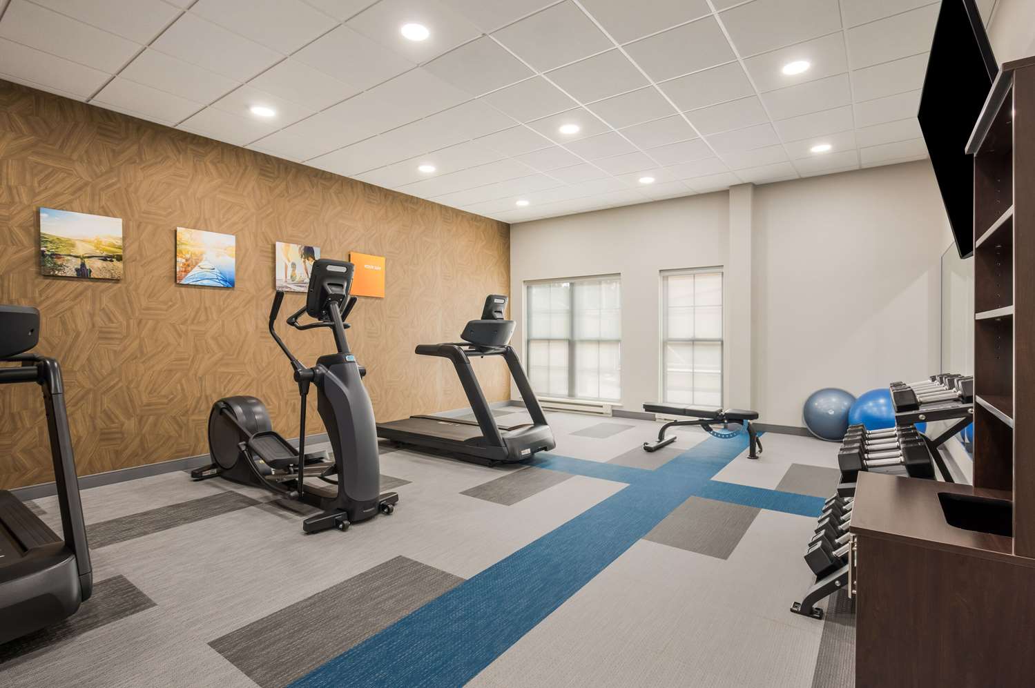 Fitness center with machines and mats
