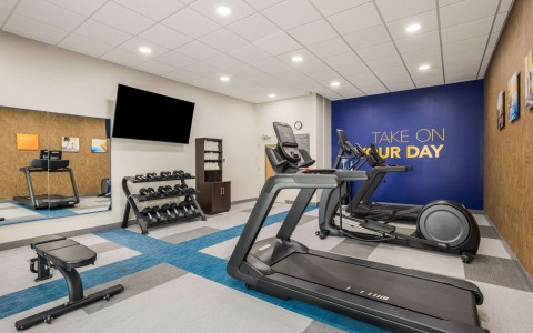 Fitness center with machines and weights