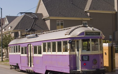purple trolley on the road