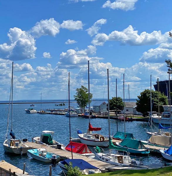 boats docked on a lake
