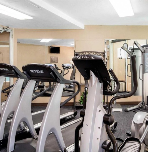 fitness center with cardio equipment