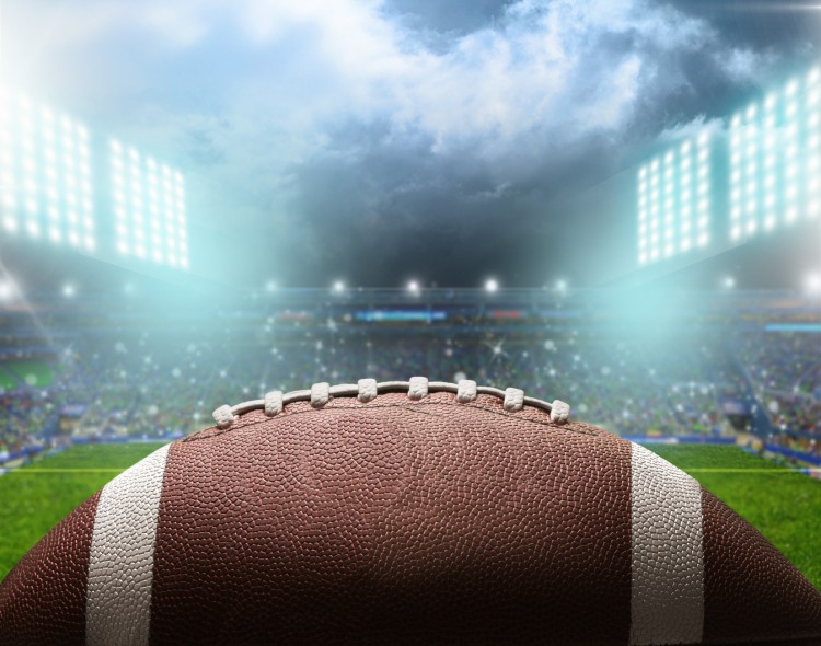 football with smoke on a field