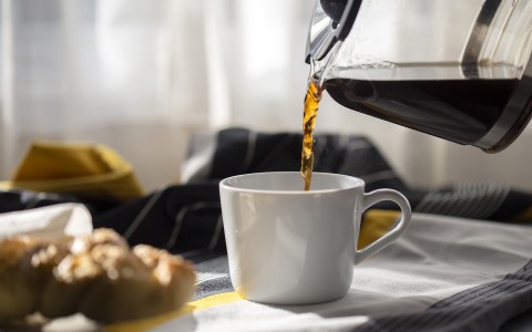 pouring hot coffee