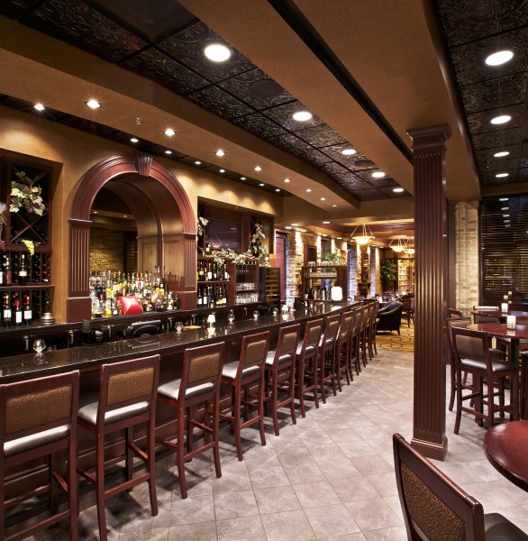 bar with dark wooden stools