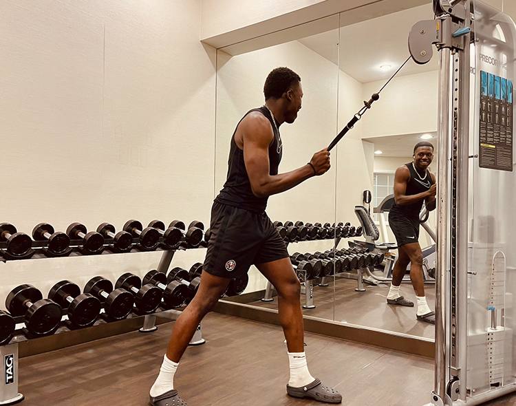 guy doing exercise at a gym