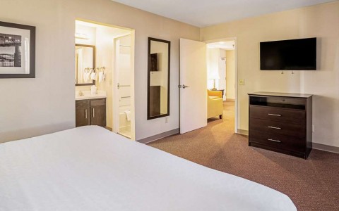 king bed in bedroom of suite