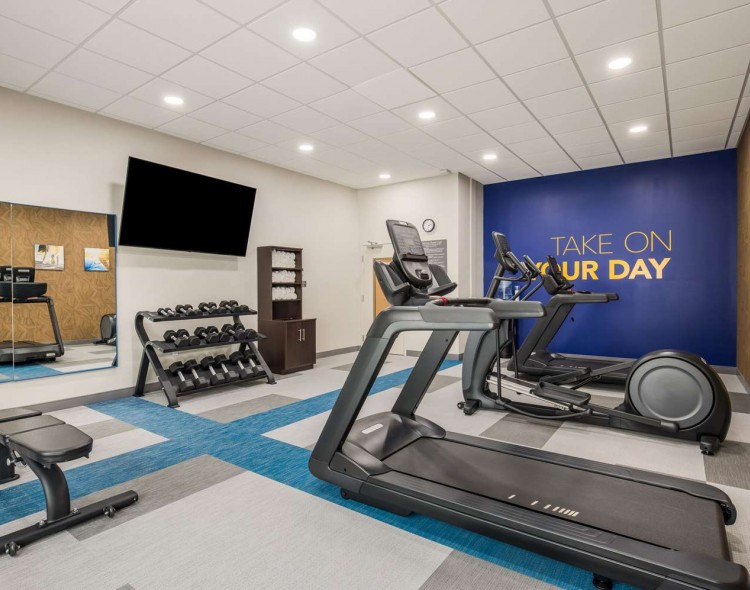 Fitness center with machines and weights
