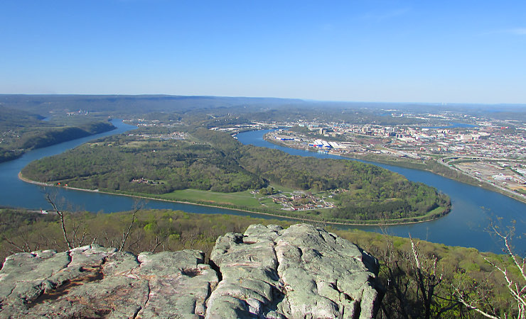 rock city attraction with view of land, town, and river
