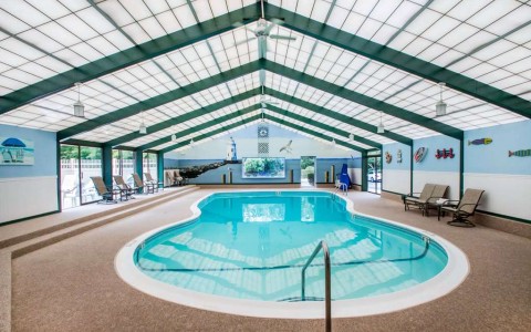 indoor pool with ceiling fans