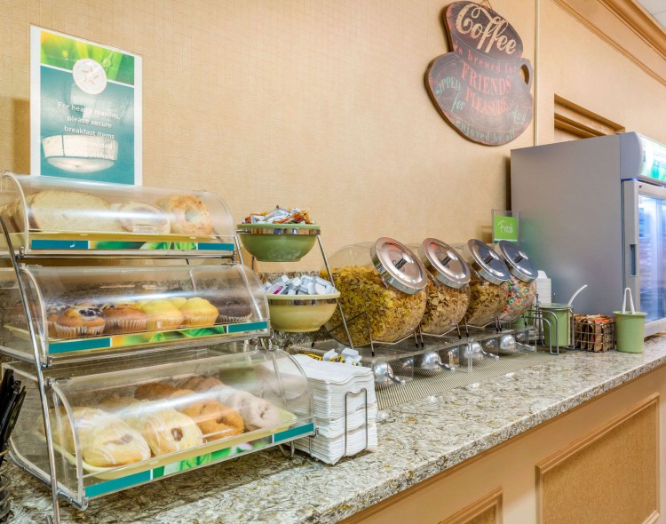counter of breakfast food like pastries and cereal