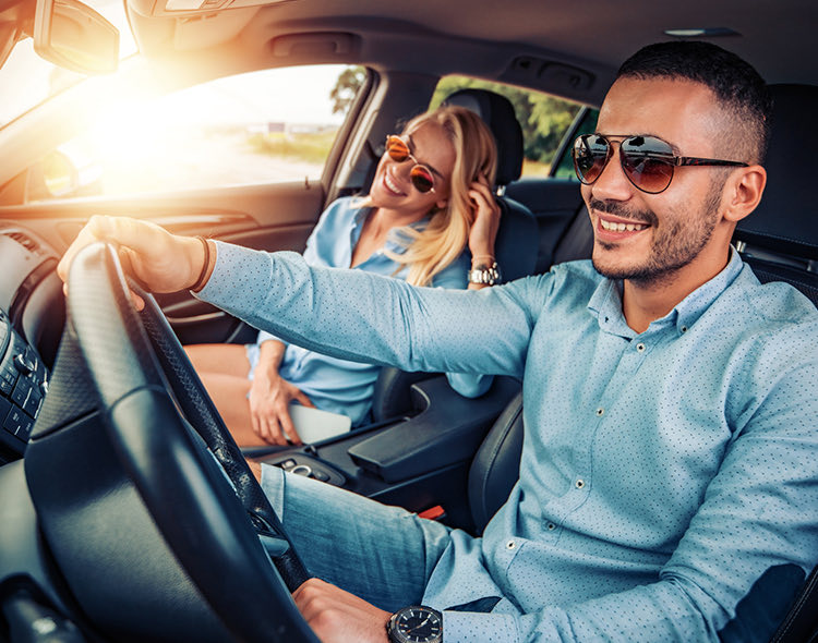 couple driving in car