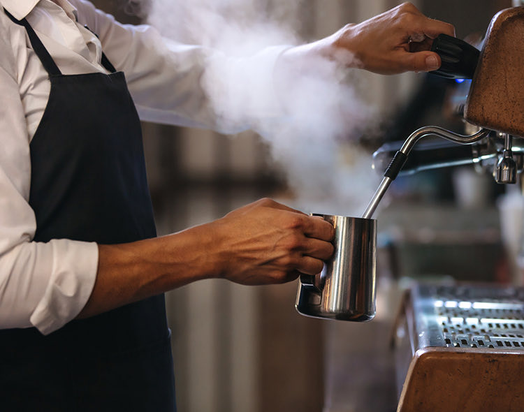 barista making coffee