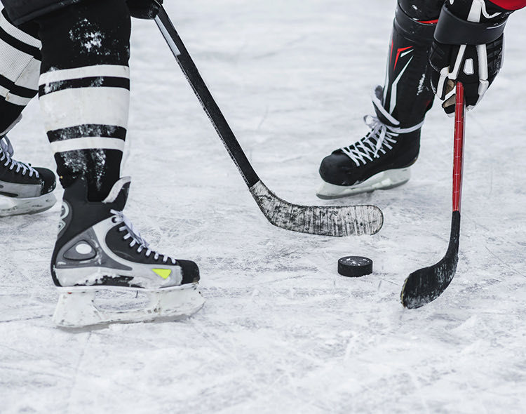 people playing ice hockey