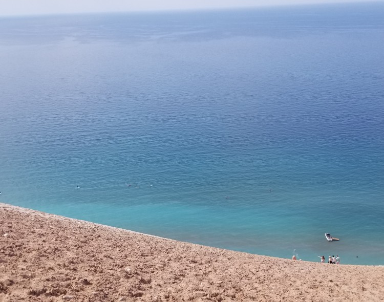 sand dunes with large body of water