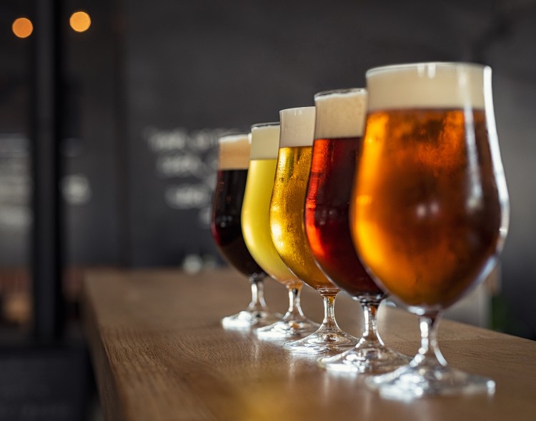 5 pints of beer lined up on counter