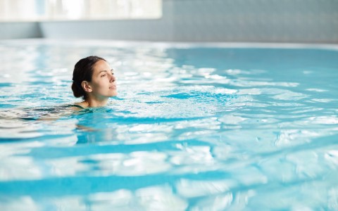 woman swimming in pool