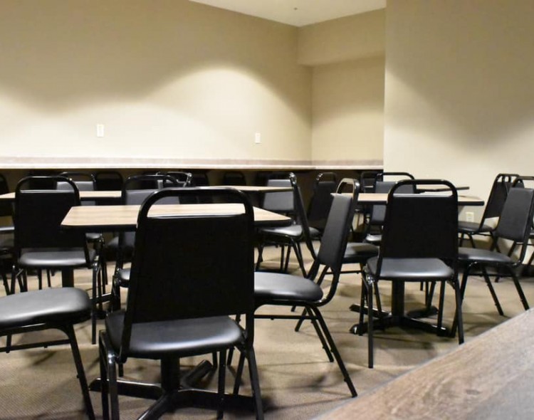 tables and chairs in a conference room