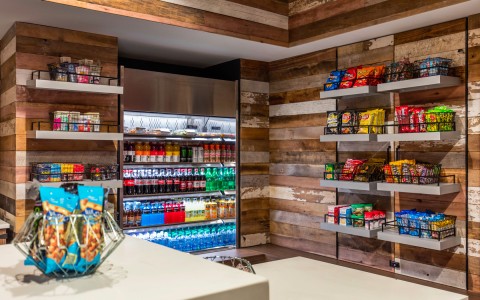 Market store view with some soft drinks and snacks  in the shelves