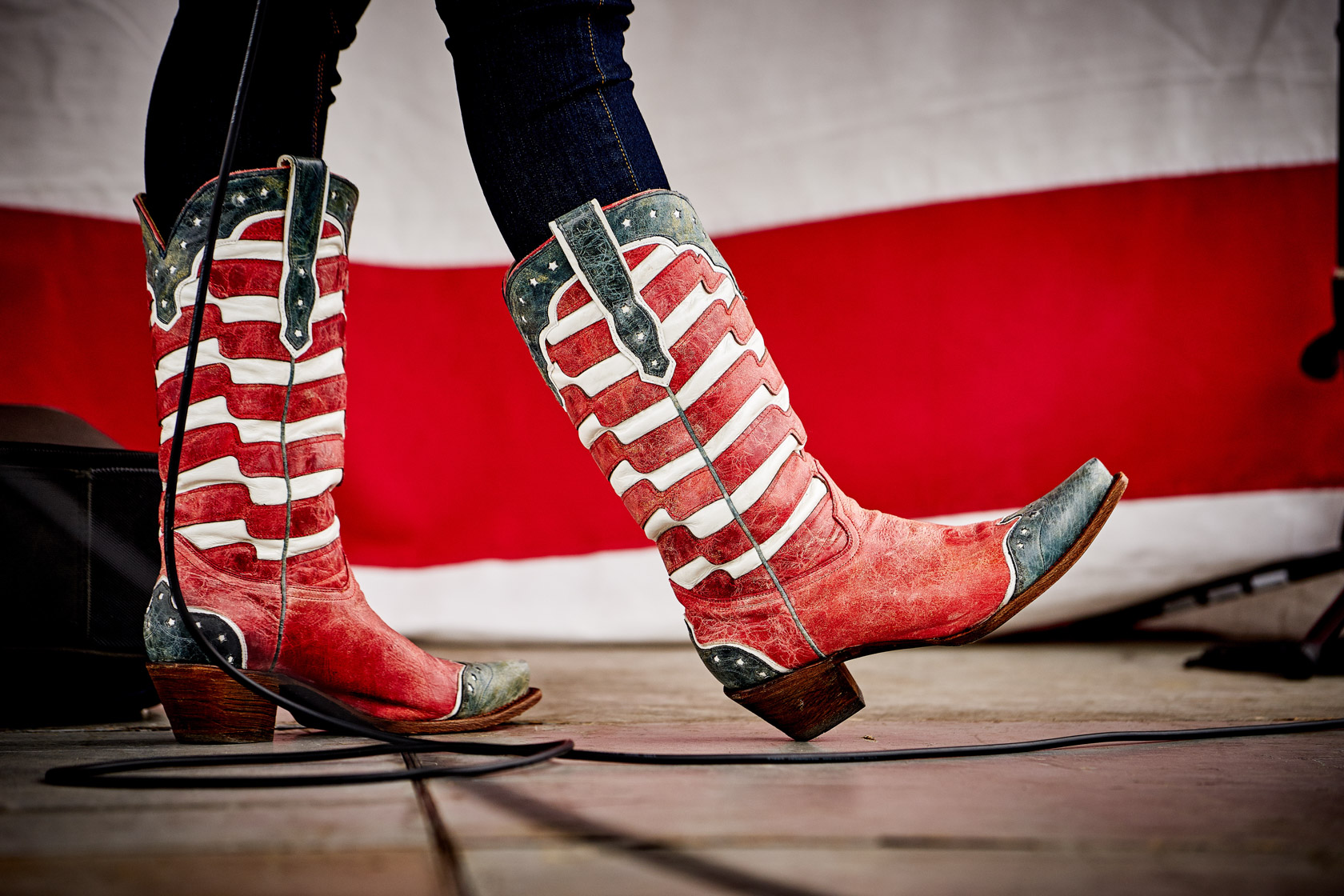 gallery closeup view of cowboy boots in red, white and blue colors