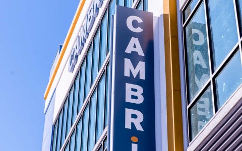 a sign of the hotel name Cambria