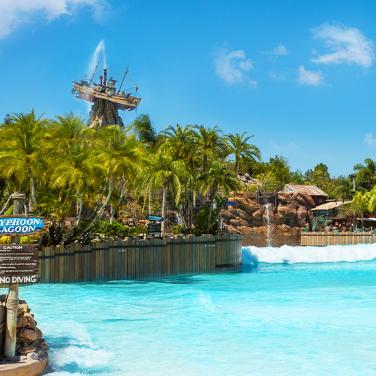 typhoon lagoon sign with wave pool and palm trees