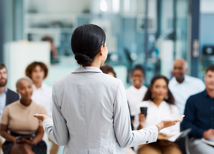 a woman holding a meeting